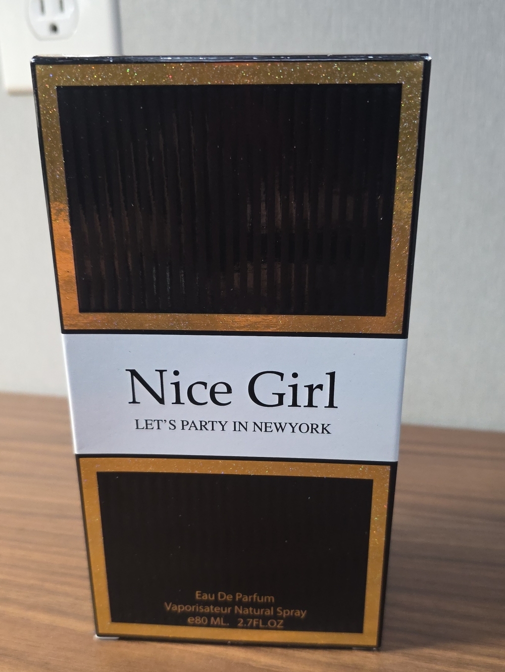 Nice Girl Eau de Parfum - Gold & Black Bottle Packaging